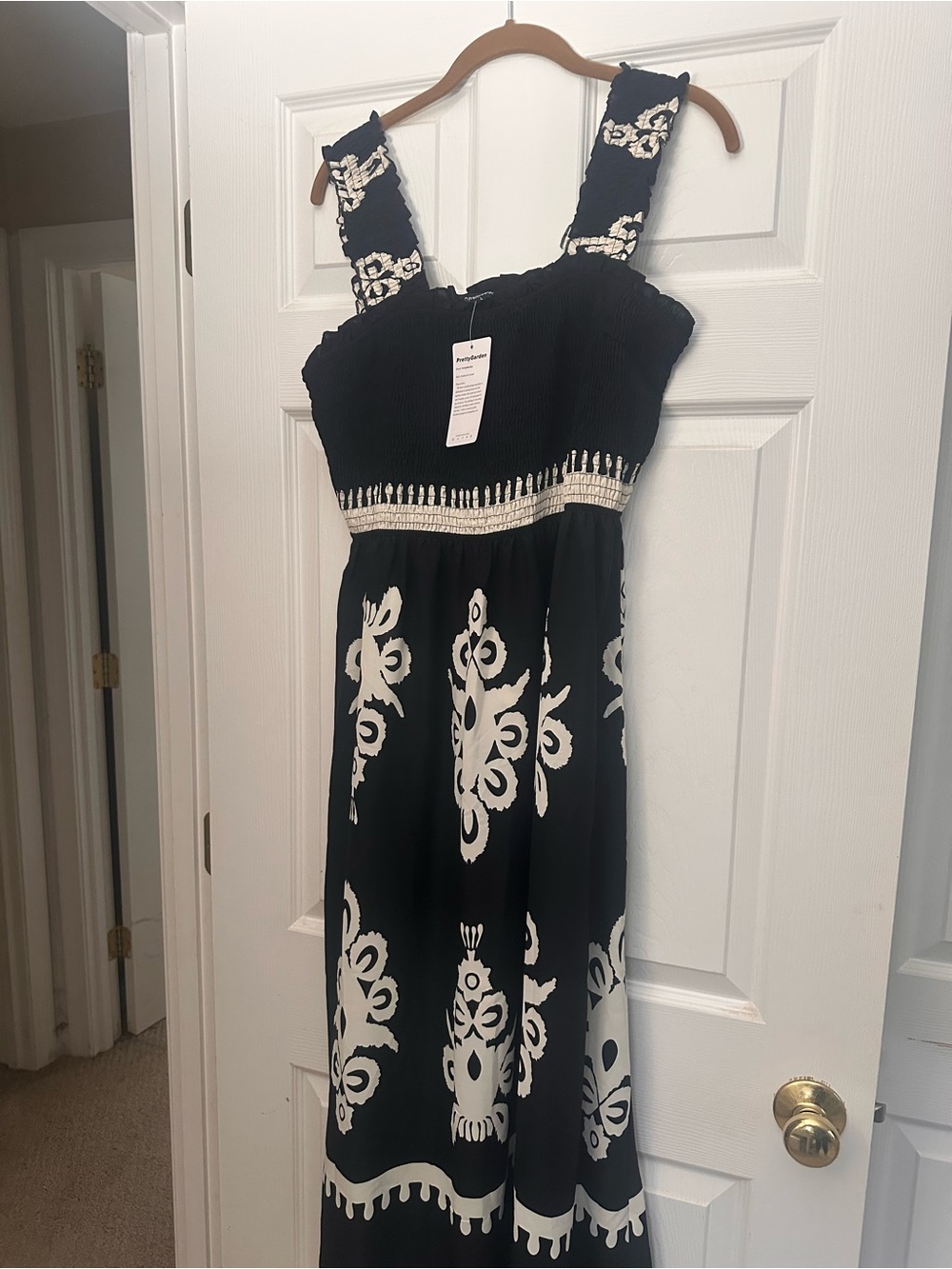 Black and White Sleeveless Maxi Dress with Smocked Bodice